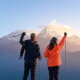 Couple trekking in Poon Hill view point in Ghorepani, Nepal